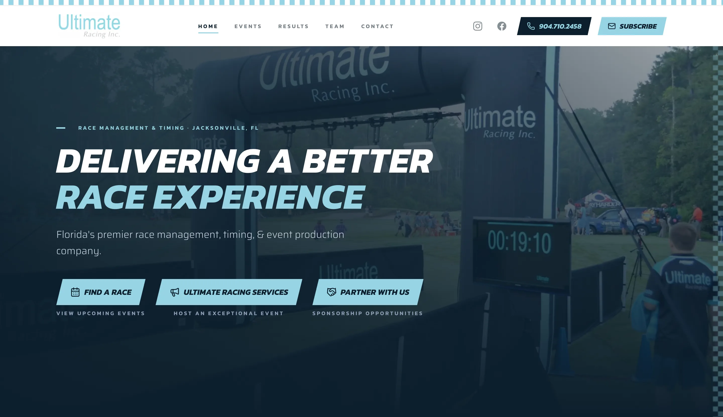 Ultimate Racing website — kinetic dark-blue hero over the company's finish-line arch and race clock